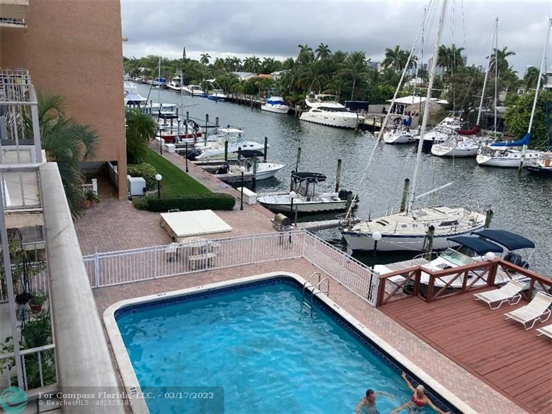 1777 Southeast 15th Street, Unit 312 Fort Lauderdale, FL 33316 - Photo 9 of 17 an aerial view of a house with outdoor seating
