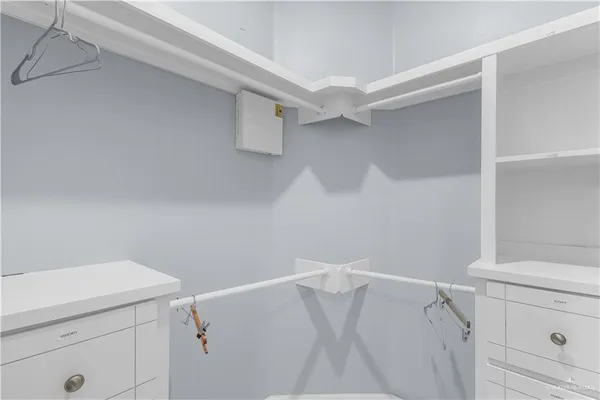 a view of an empty walk in closet