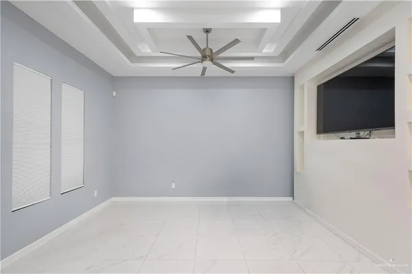 a view of a livingroom with a flat screen tv