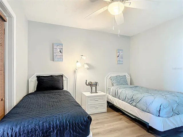 a view of a patio with a dining table and chairs