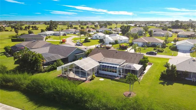 an aerial view of a house with a garden