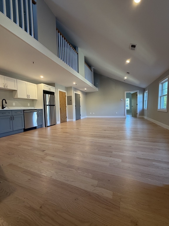 944 East Street, Unit 3 Walpole, MA 02081 - Photo 11 of 23 a view of livingroom with kitchen