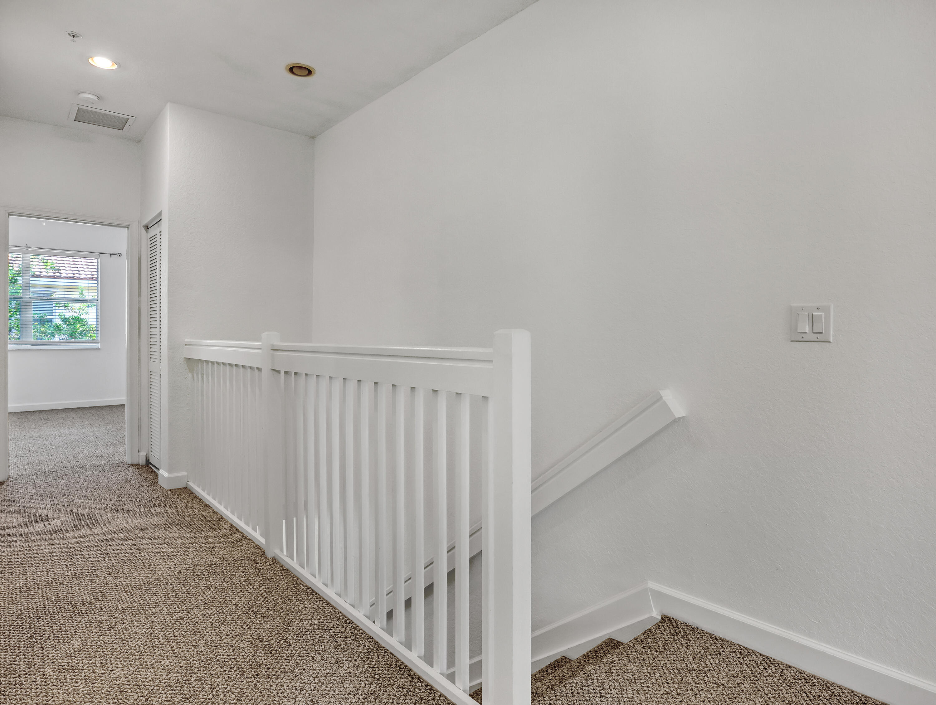 9508 Southwest Otter Lane Stuart, FL 34997 - Photo 18 of 34 a view of a hallway
