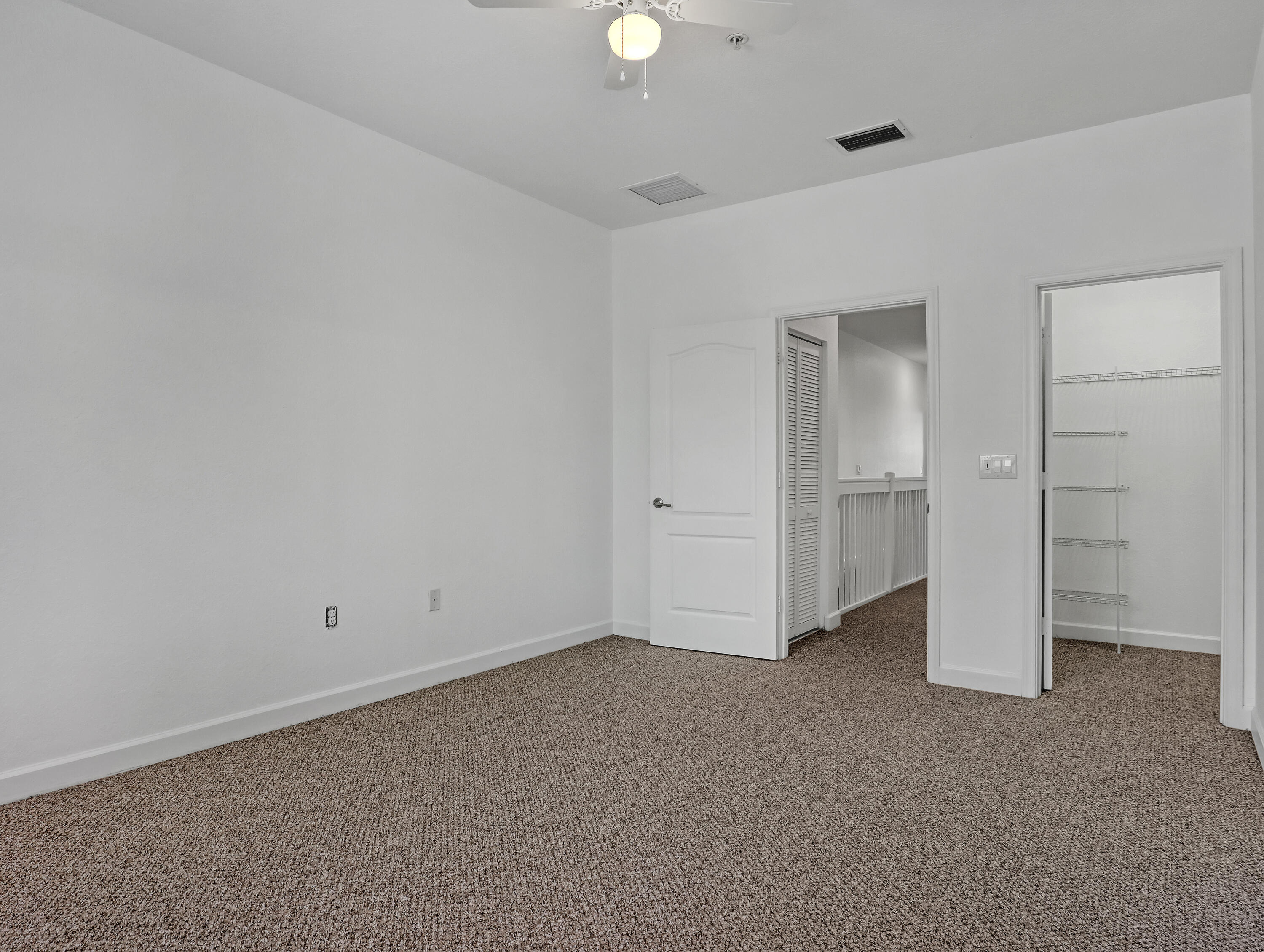 9508 Southwest Otter Lane Stuart, FL 34997 - Photo 21 of 34 wooden floor in an empty room