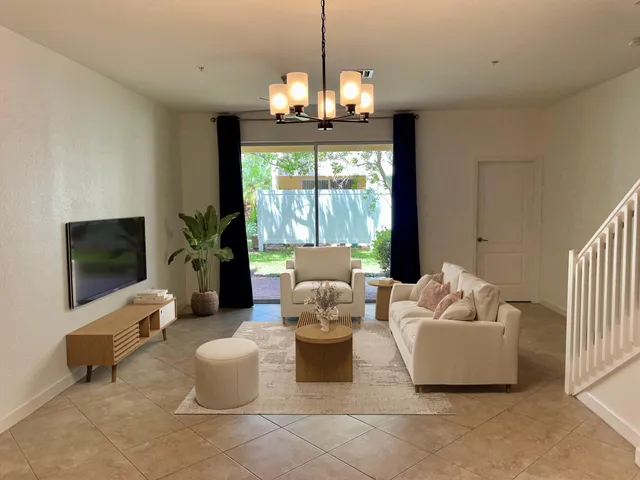 a view of a back yard from a room