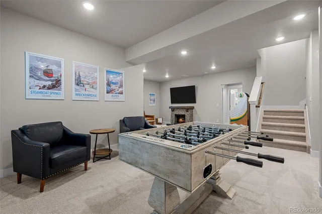 a living room with furniture and a table