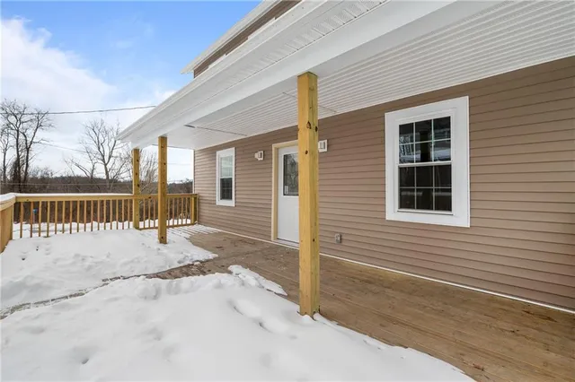 a view of a house with a roof deck