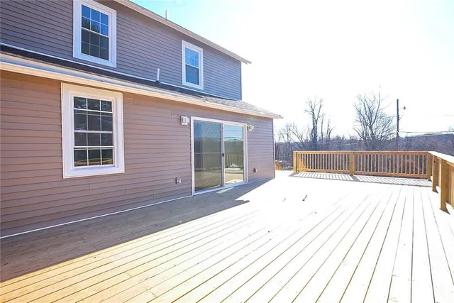 a view of a balcony with staircase