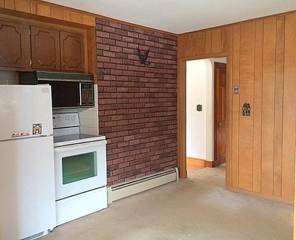 27 Ocean Park Road Saco, ME 04072 - Photo 11 of 28 This generously sized kitchen is...