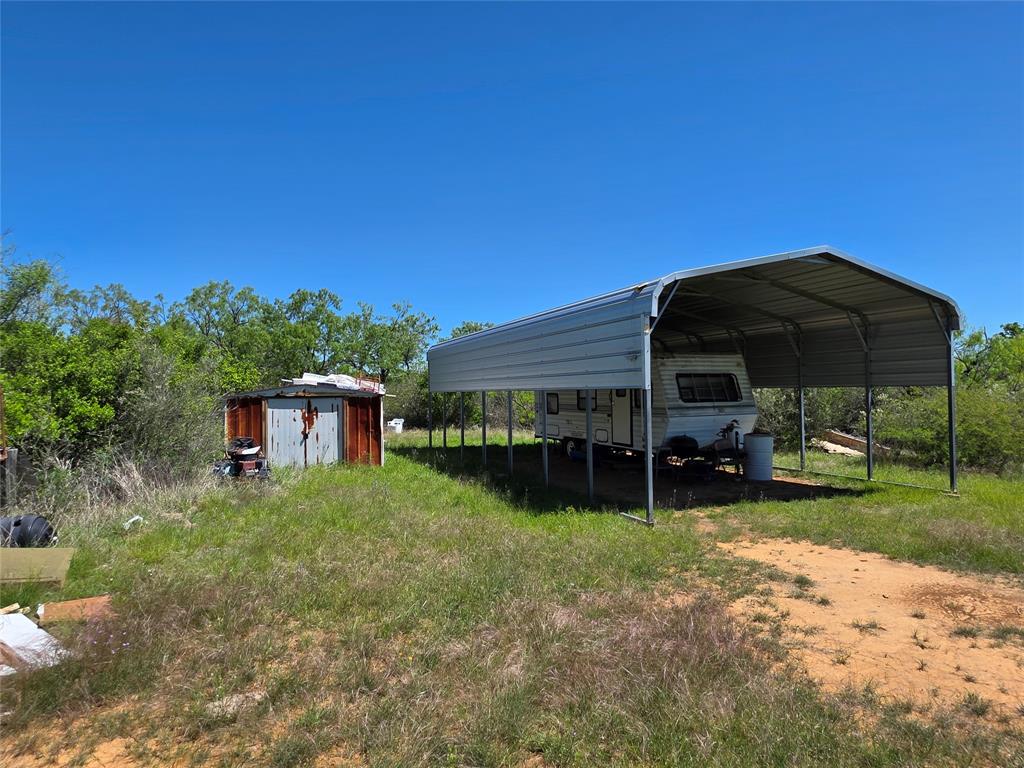 10315 Farm To Market 45 Rochelle, TX 76872 - Photo 6 of 40 a view of a house with backyard and sitting area