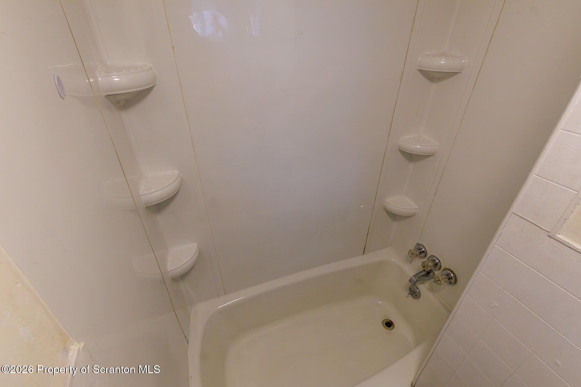 623 East Elm Street, Unit 3 Scranton, PA 18505 - Photo 14 of 18 a bathroom with a shower