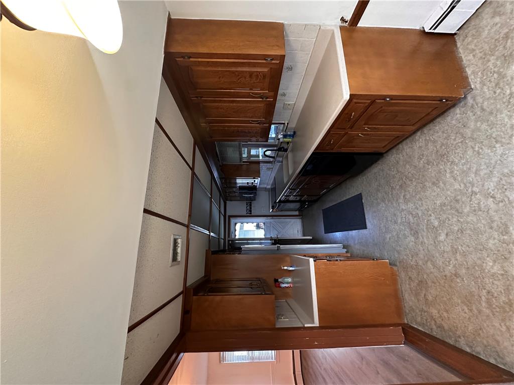5128 3rd Street Whitehall, PA 18052 - Photo 16 of 26 Functional kitchen with ample cabinetry and modern appliances.