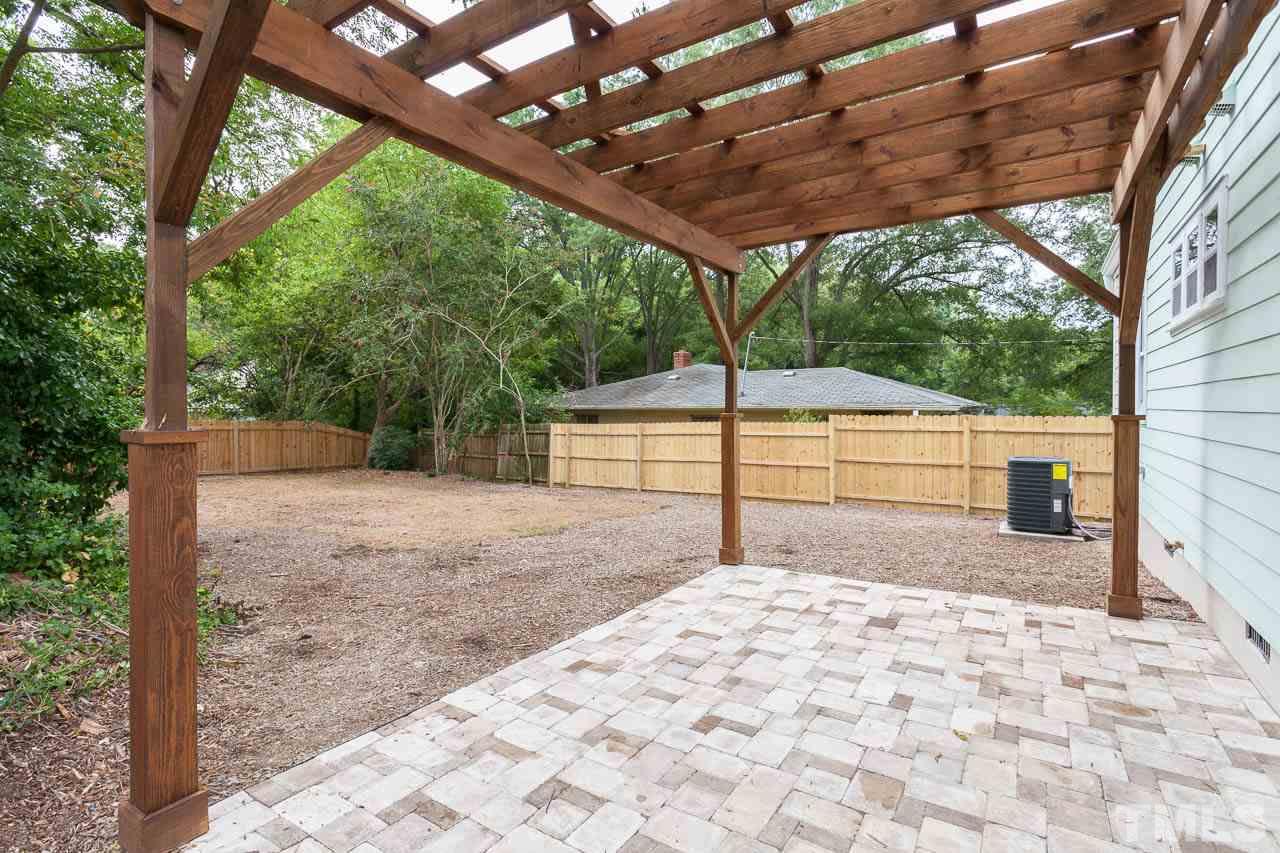 1113 Fairview Street Durham, NC 27707 - Photo 21 of 25 a view of a backyard with a large tree