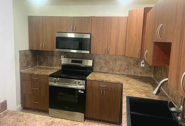 a view of swimming pool with outdoor seating