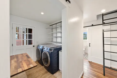 a utility room with dryer and washer