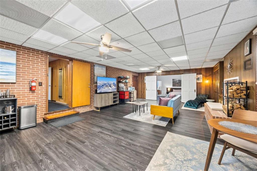 200 McGuirts Bridge Road Covington, GA 30014 - Photo 24 of 100 a living room with furniture and a flat screen tv