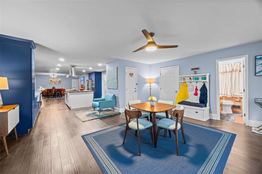 200 McGuirts Bridge Road Covington, GA 30014 - Photo 56 of 100 a living room with furniture and a wooden floor