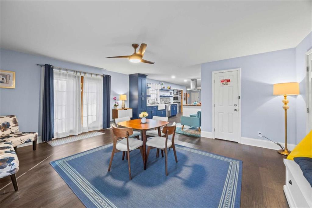 200 McGuirts Bridge Road Covington, GA 30014 - Photo 57 of 100 a living room with furniture and a wooden floor