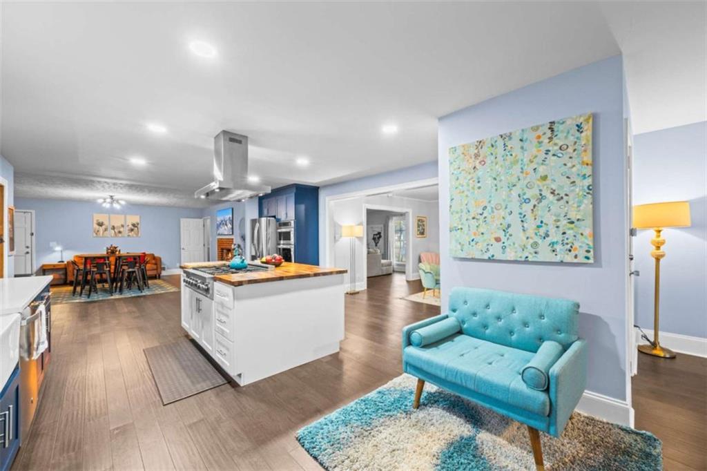 200 McGuirts Bridge Road Covington, GA 30014 - Photo 60 of 100 a living room with furniture and a wooden floor