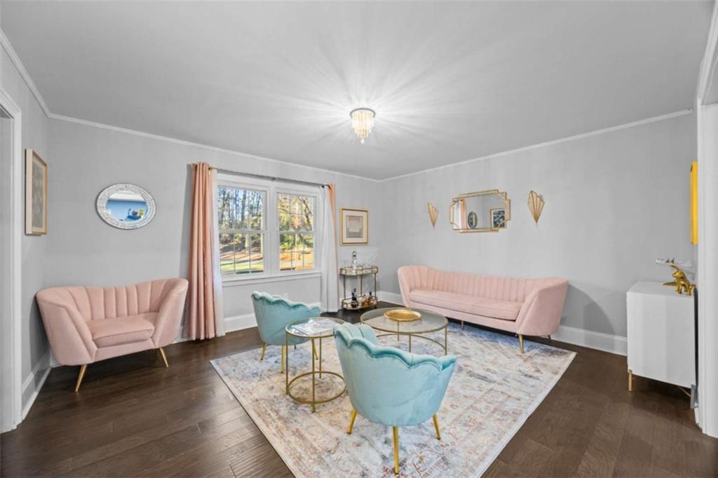 200 McGuirts Bridge Road Covington, GA 30014 - Photo 65 of 100 a living room with furniture and wooden floor