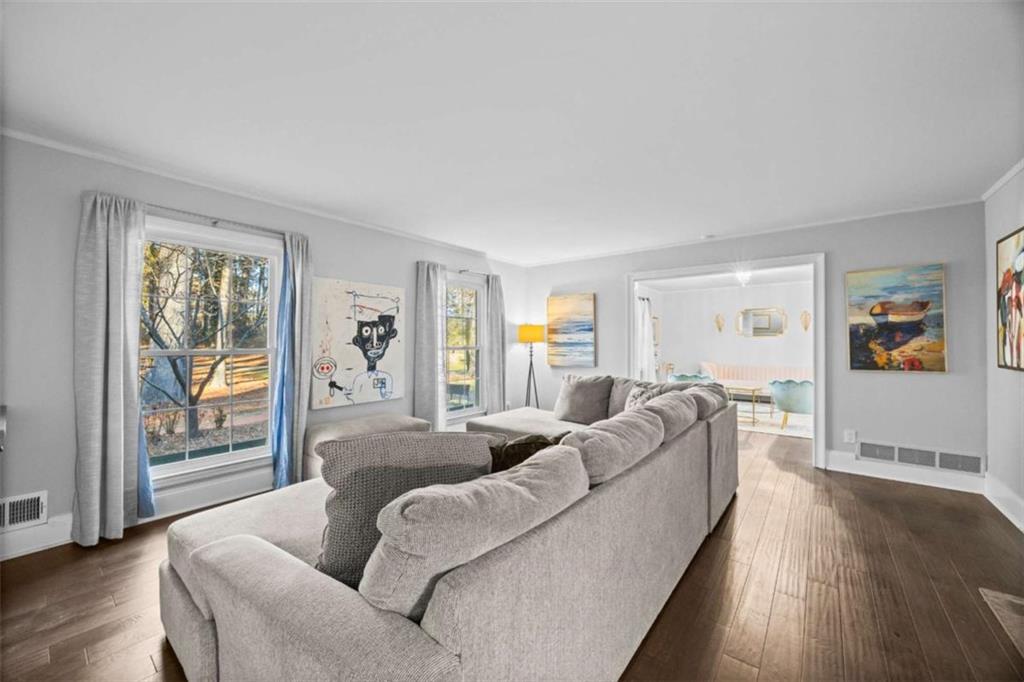 200 McGuirts Bridge Road Covington, GA 30014 - Photo 71 of 100 a living room with furniture and a large window