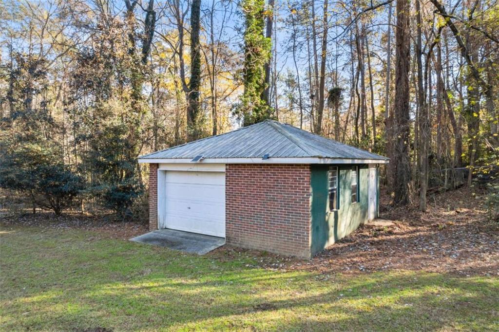 200 McGuirts Bridge Road Covington, GA 30014 - Photo 82 of 100 a view of front of a house with a yard