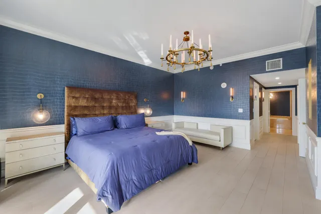 a bedroom with bed and window