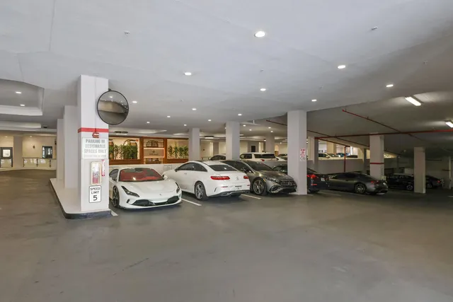 a view of a cars park in front of house