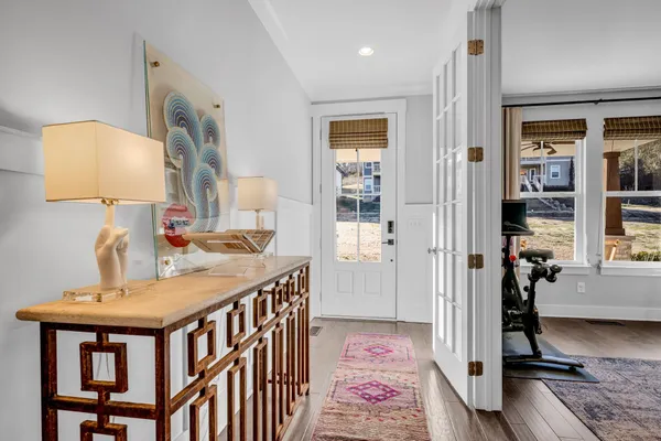 a very nice looking room with a table and chairs