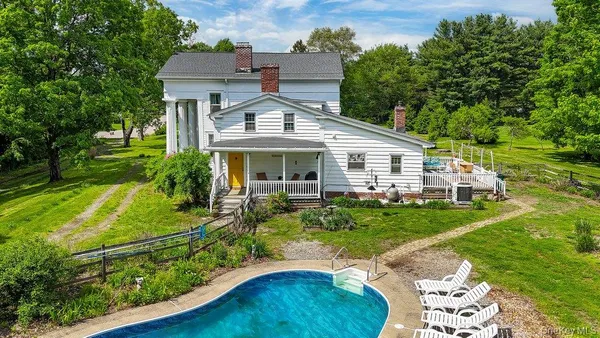 a aerial view of a house with garden