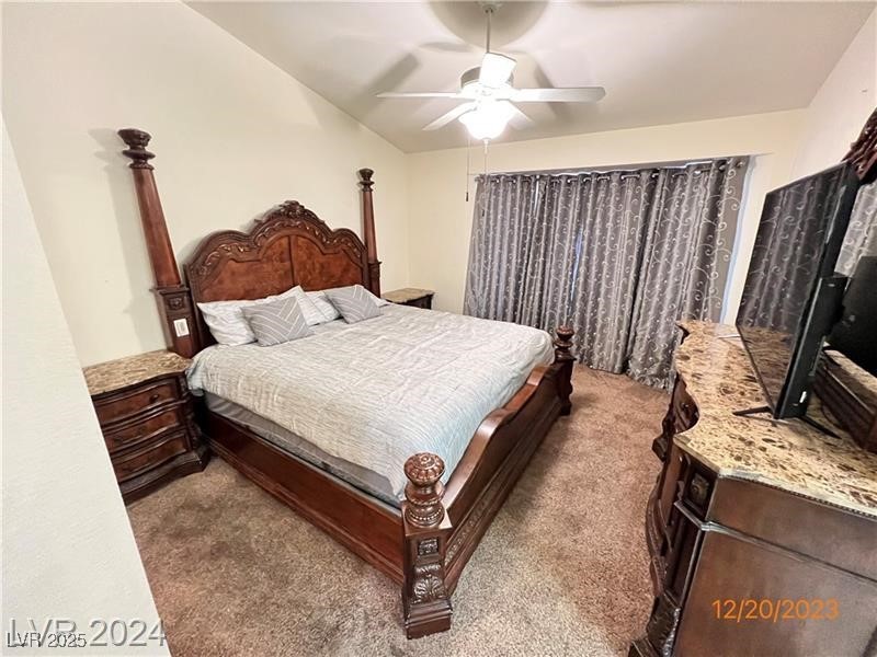 9436 Quail Ridge Drive Las Vegas, NV 89134 - Photo 11 of 17 Bedroom featuring carpet flooring and ceiling fan