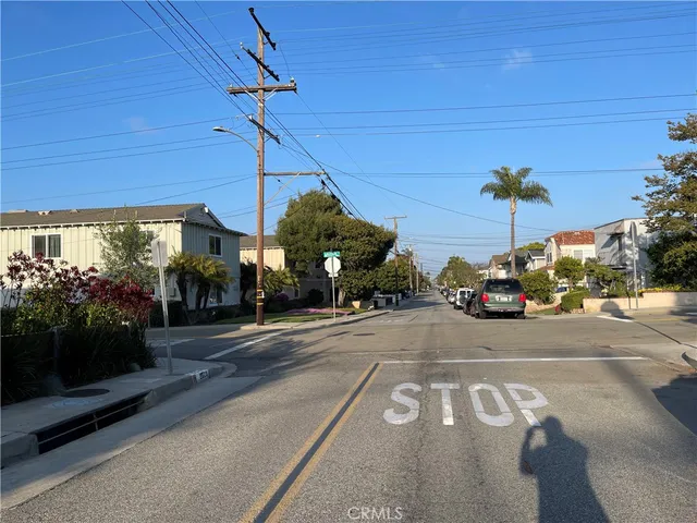 a view of a street with cars