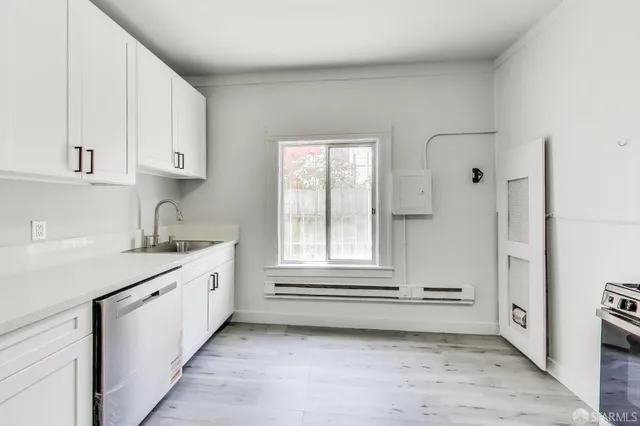 an empty room with windows