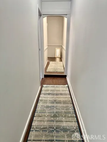 a kitchen with a sink appliances and cabinets