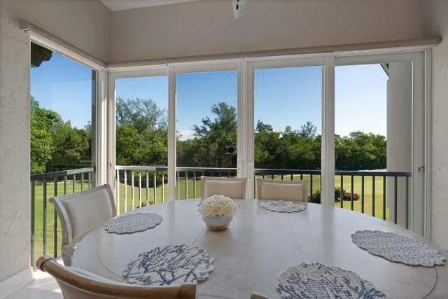 a view of a room with a balcony