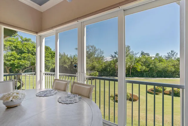 a bedroom with a bed and a table