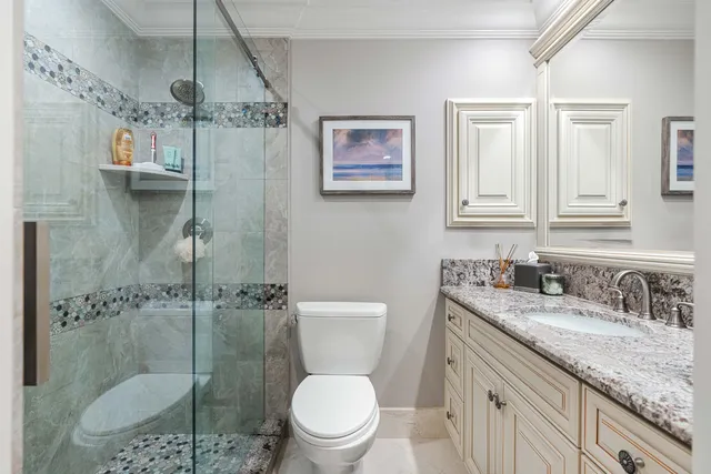 a bed room with a bed and a chair