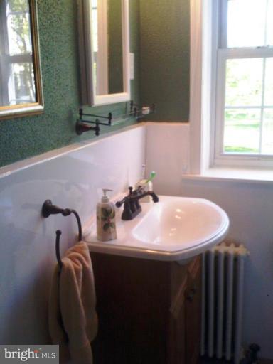 2406 Colston Drive, Unit 101 Silver Spring, MD 20910 - Photo 9 of 13 Renovated Bathroom with large Tub/shower