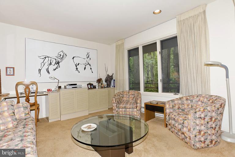 16215 Comus Road Clarksburg, MD 20871 - Photo 1 of 29 a living room with furniture and a large window