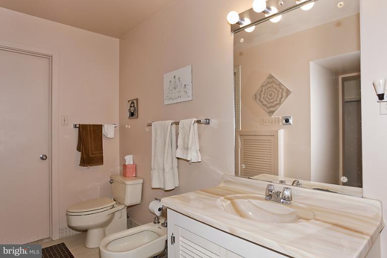 16215 Comus Road Clarksburg, MD 20871 - Photo 2 of 29 a bathroom with a sink vanity mirror and toilet