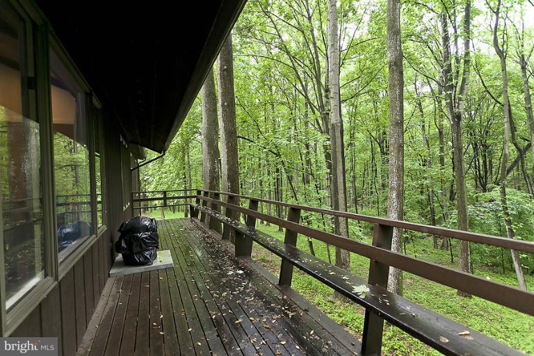 16215 Comus Road Clarksburg, MD 20871 - Photo 20 of 29 a view of a balcony with chairs