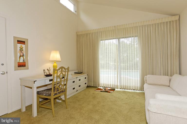 16215 Comus Road Clarksburg, MD 20871 - Photo 25 of 29 a bedroom with furniture and a large window