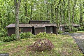 16215 Comus Road Clarksburg, MD 20871 - Photo 28 of 29 a front view of a house with garden