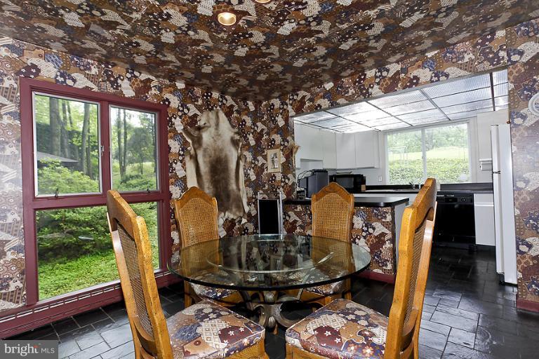 16215 Comus Road Clarksburg, MD 20871 - Photo 6 of 29 a dining room with furniture and wooden floor