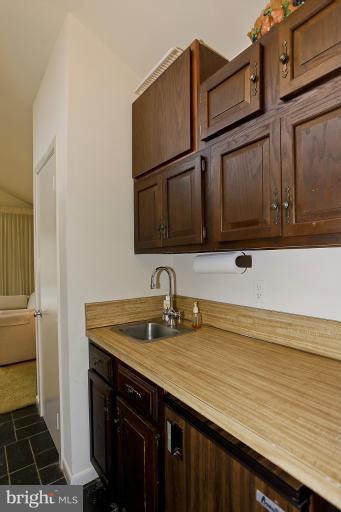 16215 Comus Road Clarksburg, MD 20871 - Photo 10 of 29 a kitchen with a sink and cabinets