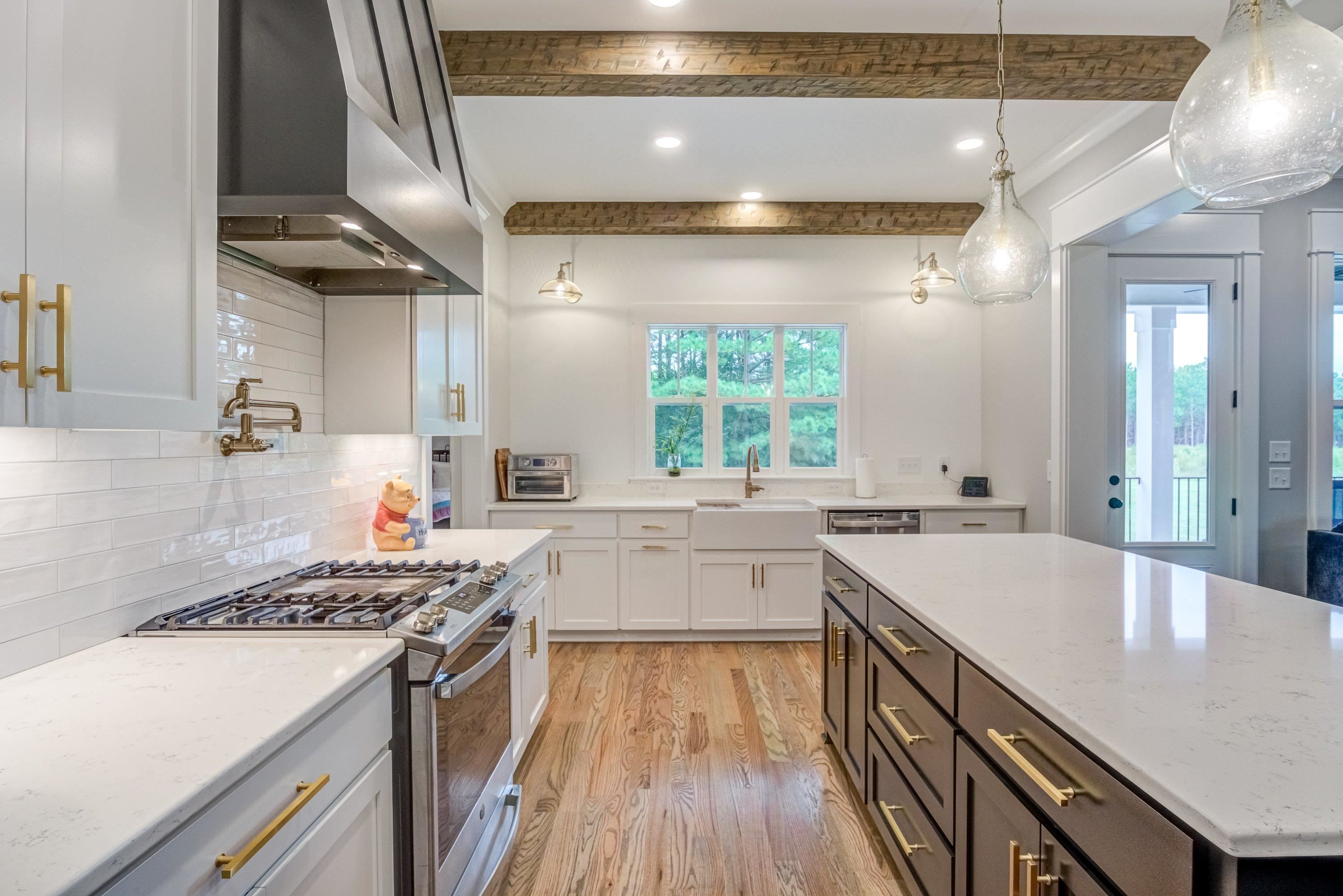 109 Independence Drive Smithfield, NC 27577 - Photo 11 of 36 a kitchen with a sink stove and cabinets