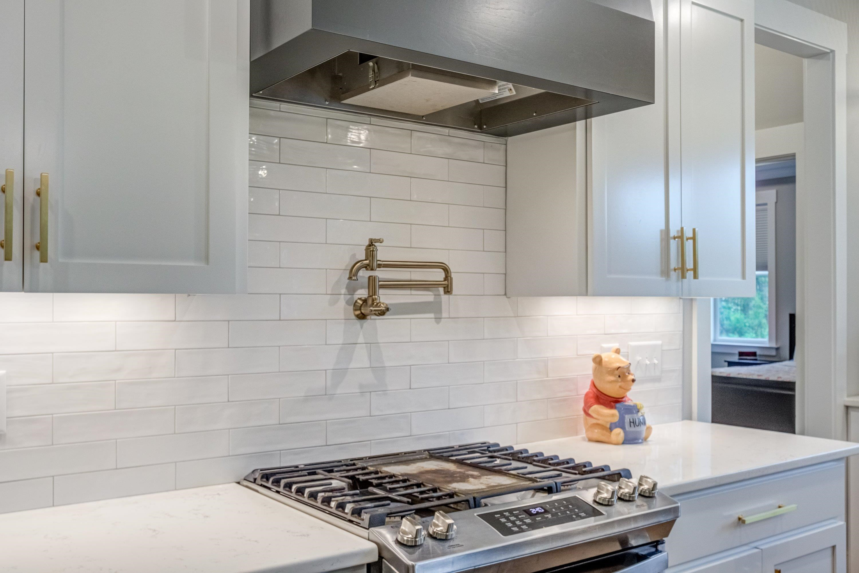 109 Independence Drive Smithfield, NC 27577 - Photo 12 of 36 a kitchen with a stove and cabinets
