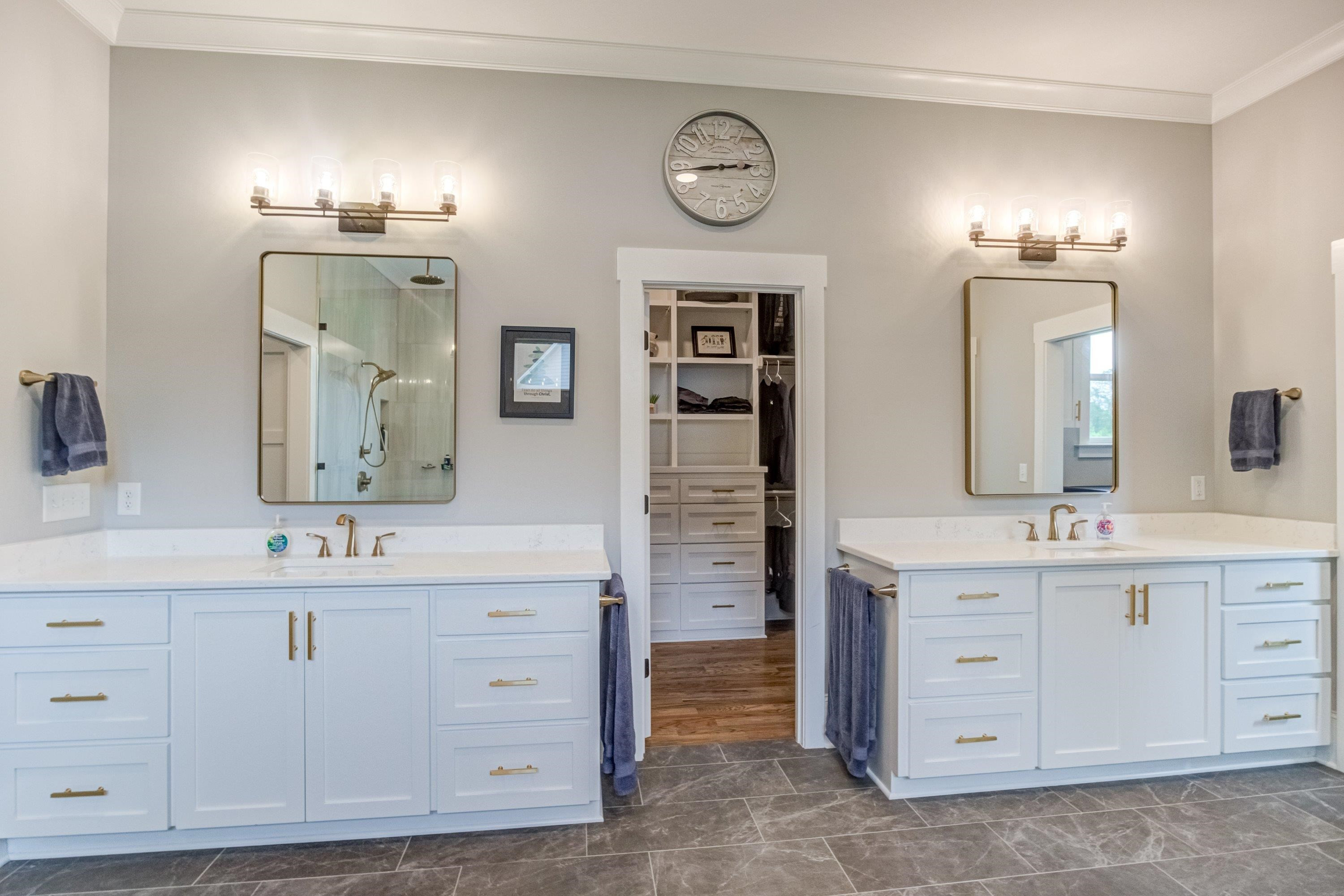 109 Independence Drive Smithfield, NC 27577 - Photo 18 of 36 a spacious bathroom with double sink and a mirror