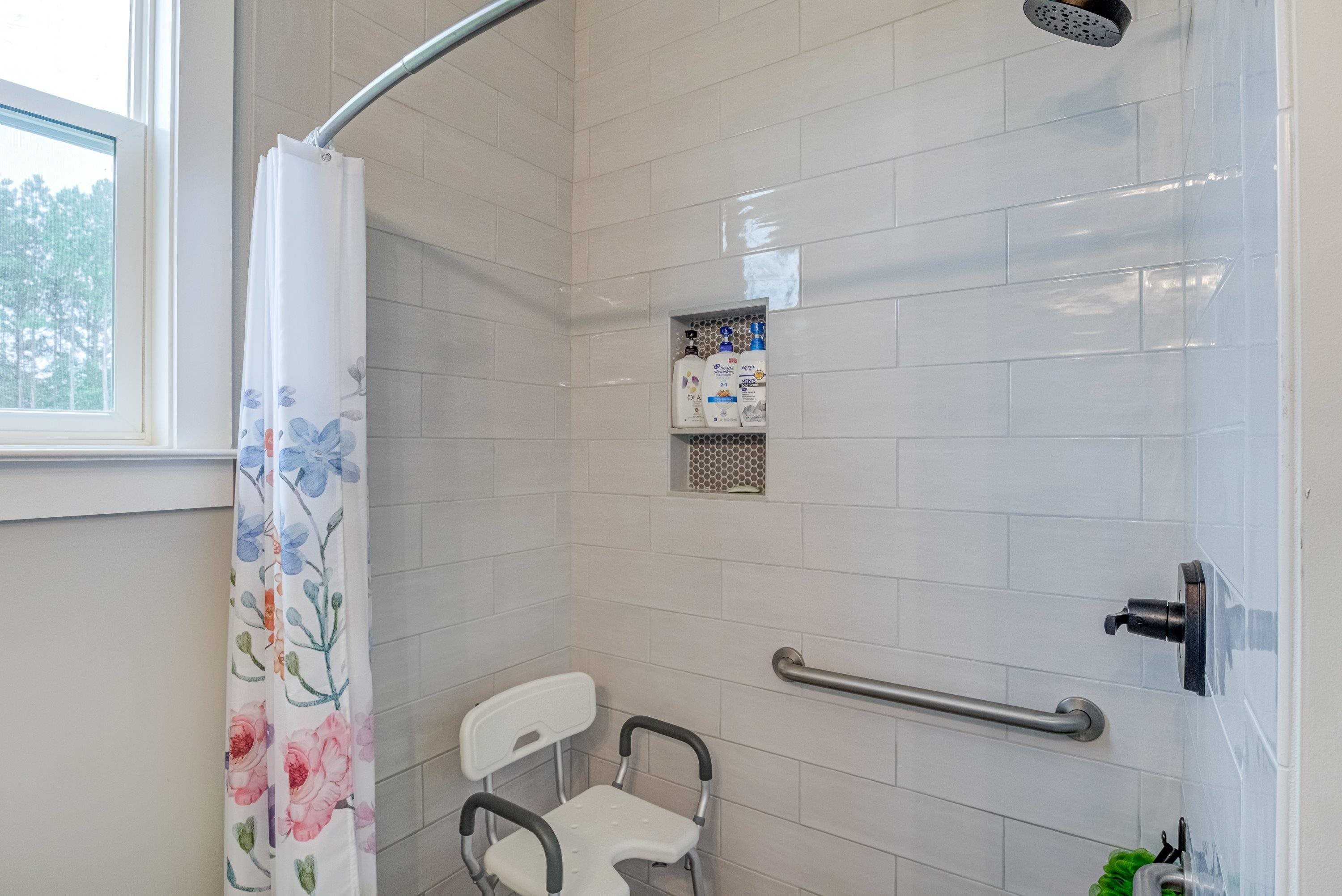 109 Independence Drive Smithfield, NC 27577 - Photo 23 of 36 a bathroom with a shower