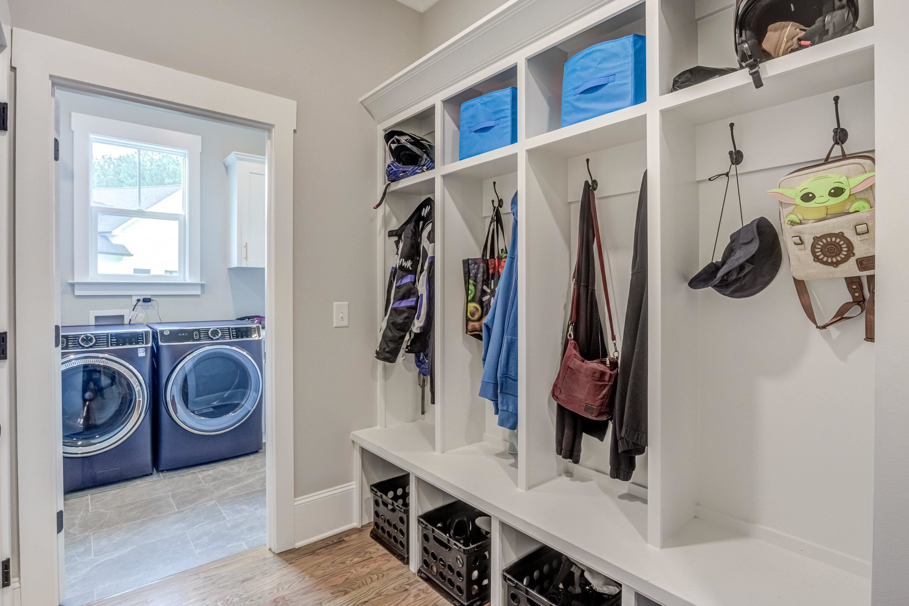 109 Independence Drive Smithfield, NC 27577 - Photo 30 of 36 a view of walk in closet with clothes and shoes